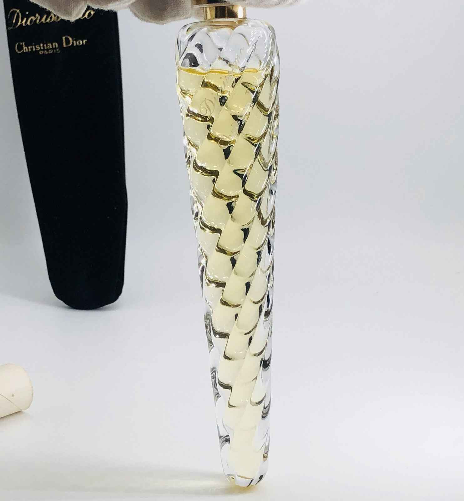 Flacone di profumo Dior Diorissimo Vintage con design elegante e fragranza raffinata