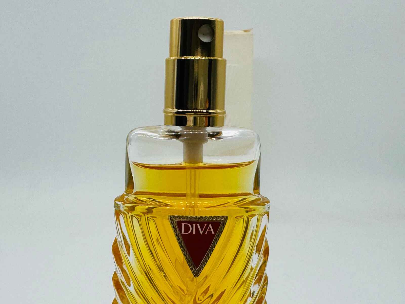 Flacone di Profumo Diva Ungaro Vintage con design elegante e tonalità dorata