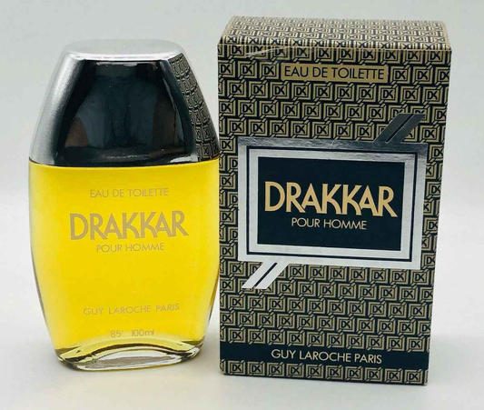 Profumo Drakkar Laroche Vintage in flacone giallo con confezione elegante dalla grafica nera e dorata