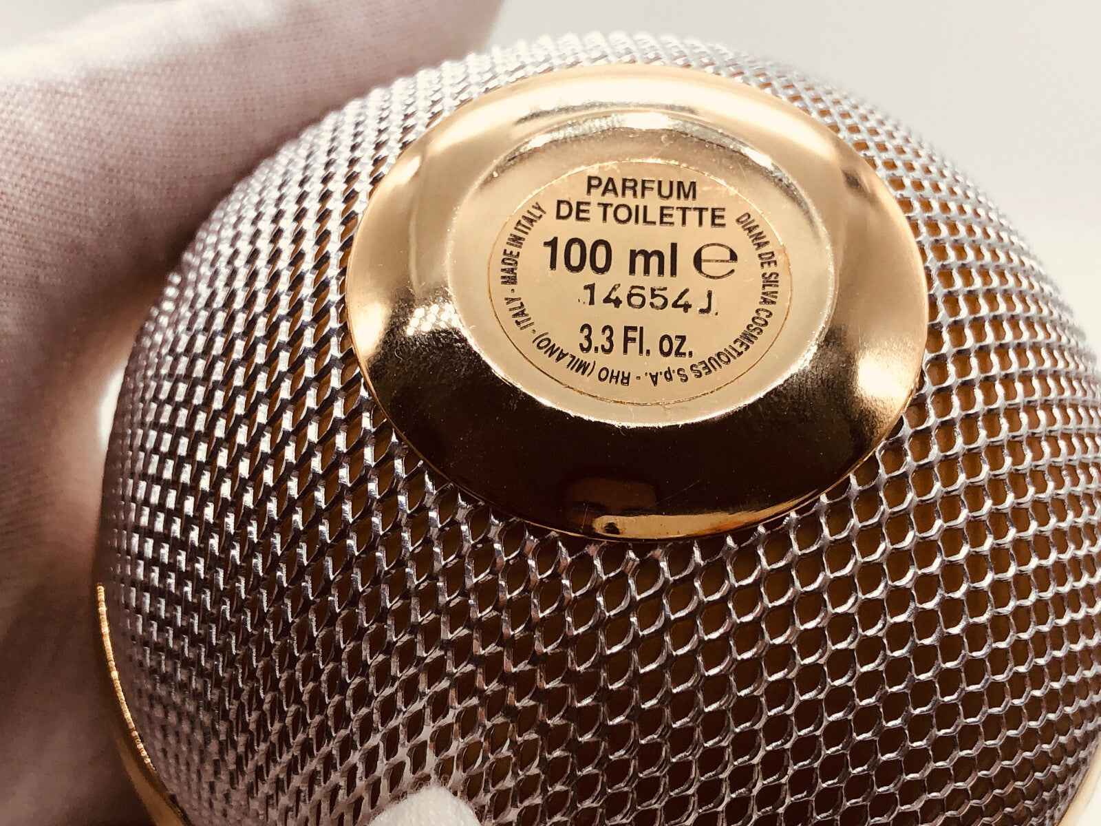 Base del flacone del profumo Ferre Vintage da 100 ml, elegante e con dettagli dorati
