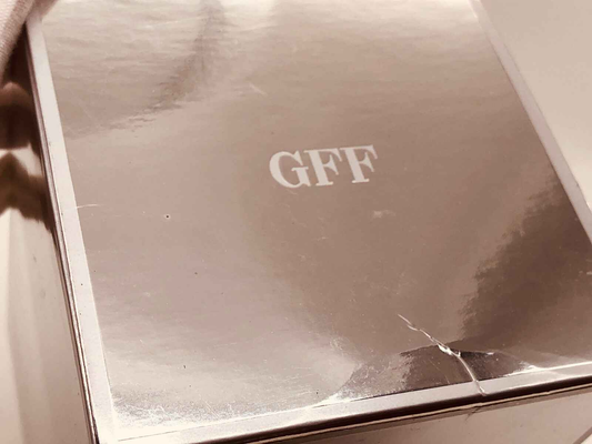 Scatola del Profumo Ferre Vintage con logo GFF elegante e design raffinato