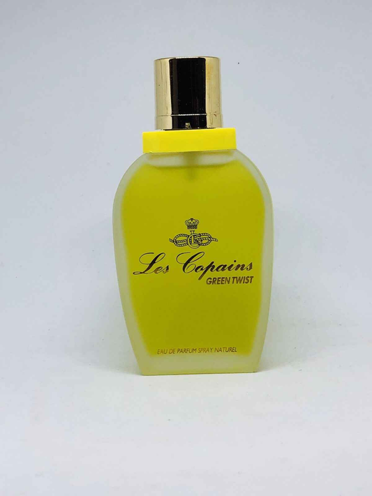 Flacone di profumo Les Copains Green Twist in vetro giallo con tappo dorato per un aroma fresco e vivace