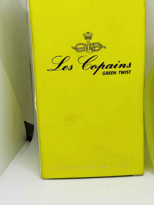 Scatola di Profumo Les Copains Green Twist con design giallo vivace per un profumo fresco e avvolgente