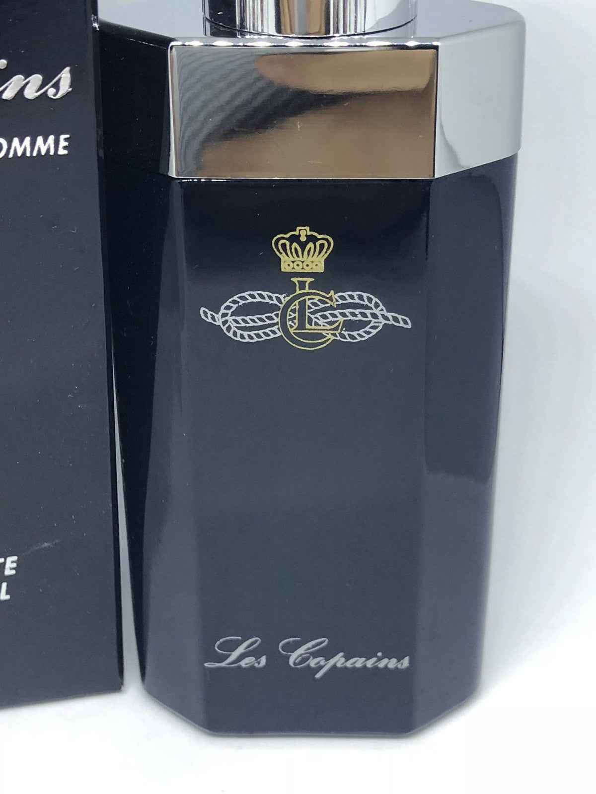 Flacone di profumo Les Copains Vintage con design elegante e logo dorato