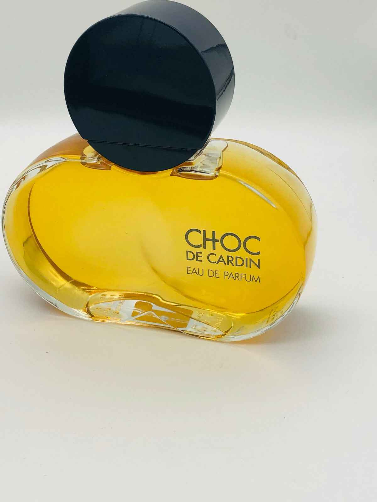 Profumo Pierre Cardin Choc in bottiglia elegante con tappo nero per un profumo raffinato