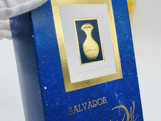 Scatola del profumo Salvador Dali Vintage con design elegante e logo dorato