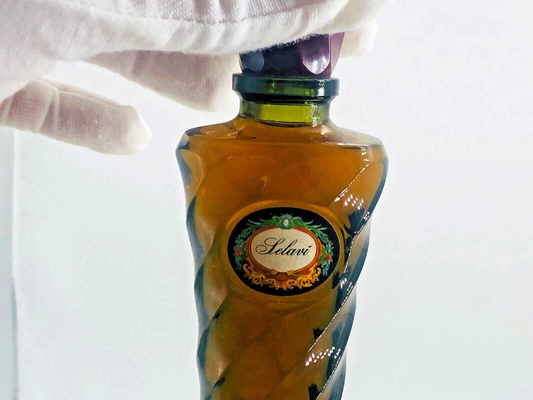 Profumo Schuberth Selavi Vintage in bottiglia elegante con dettagli artistici