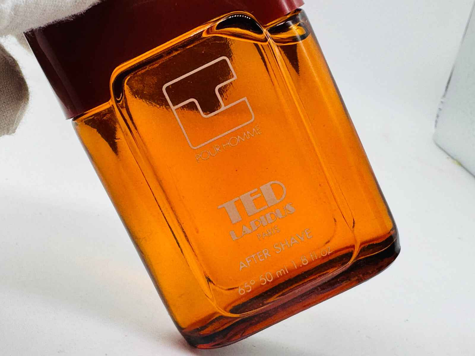 Flacone di profumo Ted Lapidus Pour Homme da 50 ml in vetro arancione, perfetto dopo la rasatura