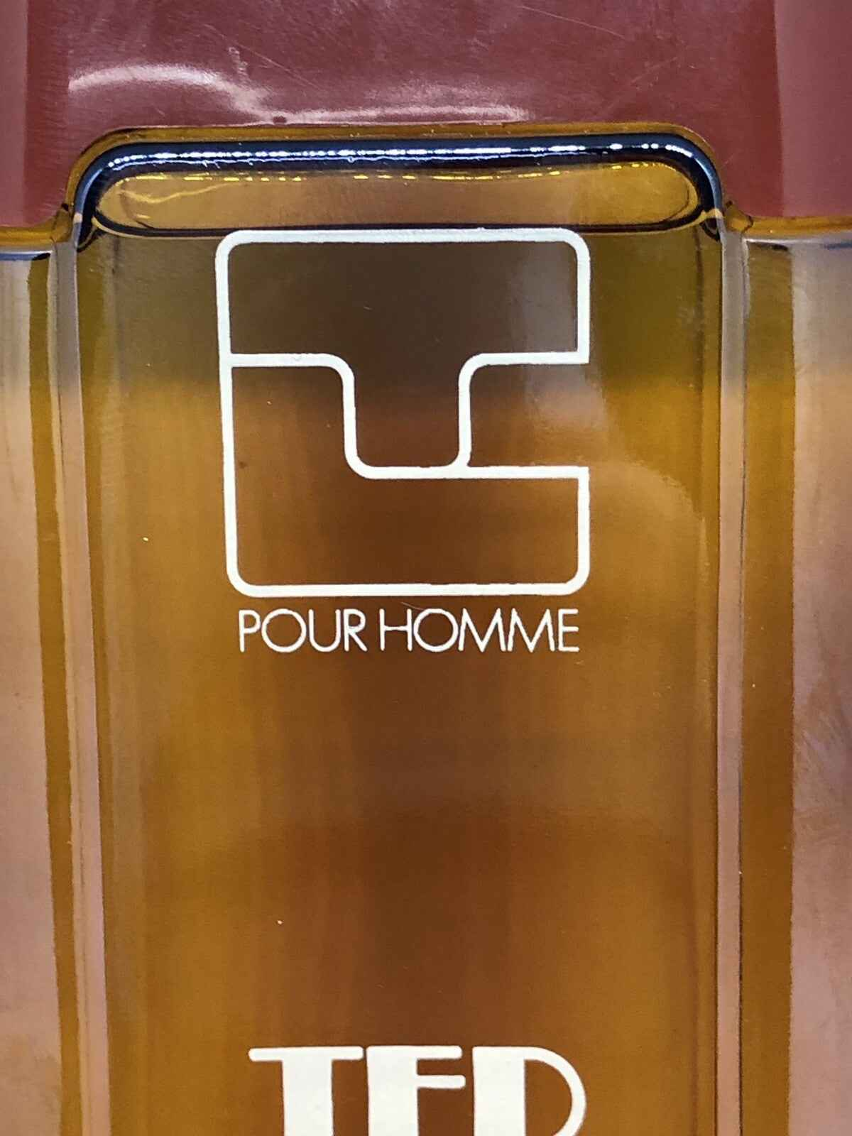 Flacone di Profumo Ted Lapidus Pour Homme con design elegante e sofisticato