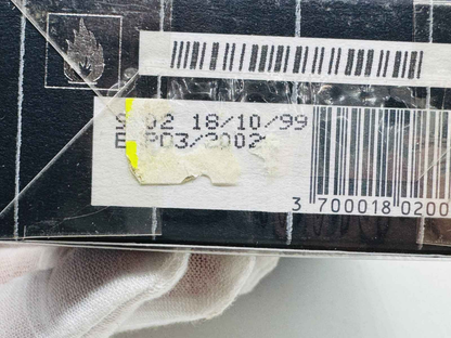 Etichetta del profumo vintage Francesco Smalto su confezione con codice a barre e data di scadenza