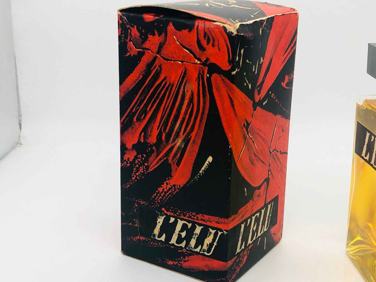 Scatola del profumo Vintage Salvador Dali con design artistico in rosso e nero