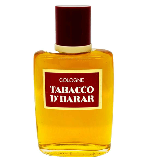 Profumo Vintage Tabacco in flacone elegante con etichetta gialla e tappo rosso per un aroma unico