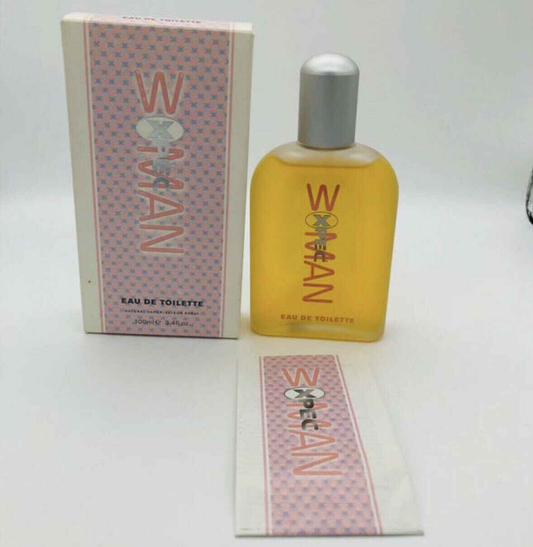 Profumo Xpec Woma in flacone giallo con confezione elegante per donne