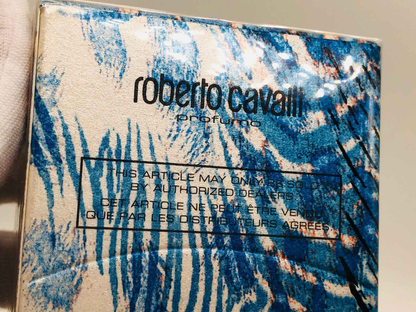 Scatola di profumo Roberto Cavalli Man con design astratto e colori vivaci