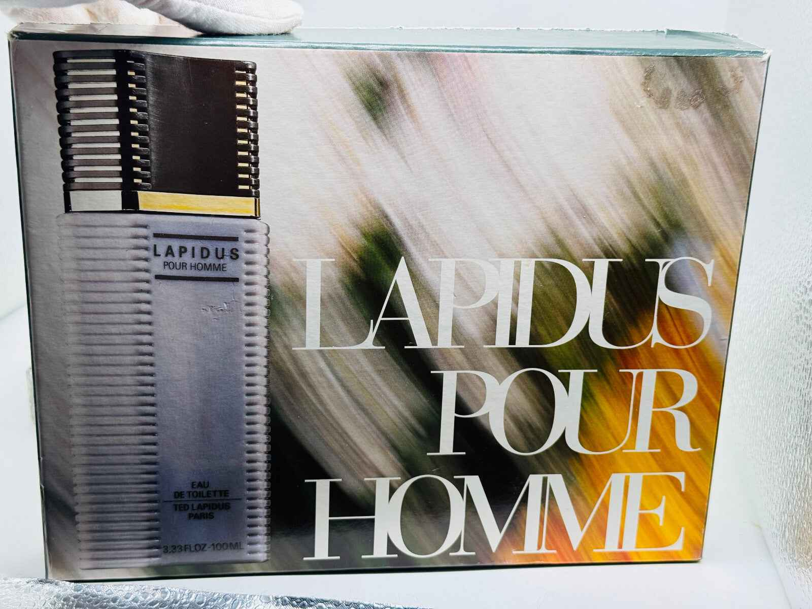 Confezione di profumo Ted Lapidus Pour Homme con flacone elegante e design moderno