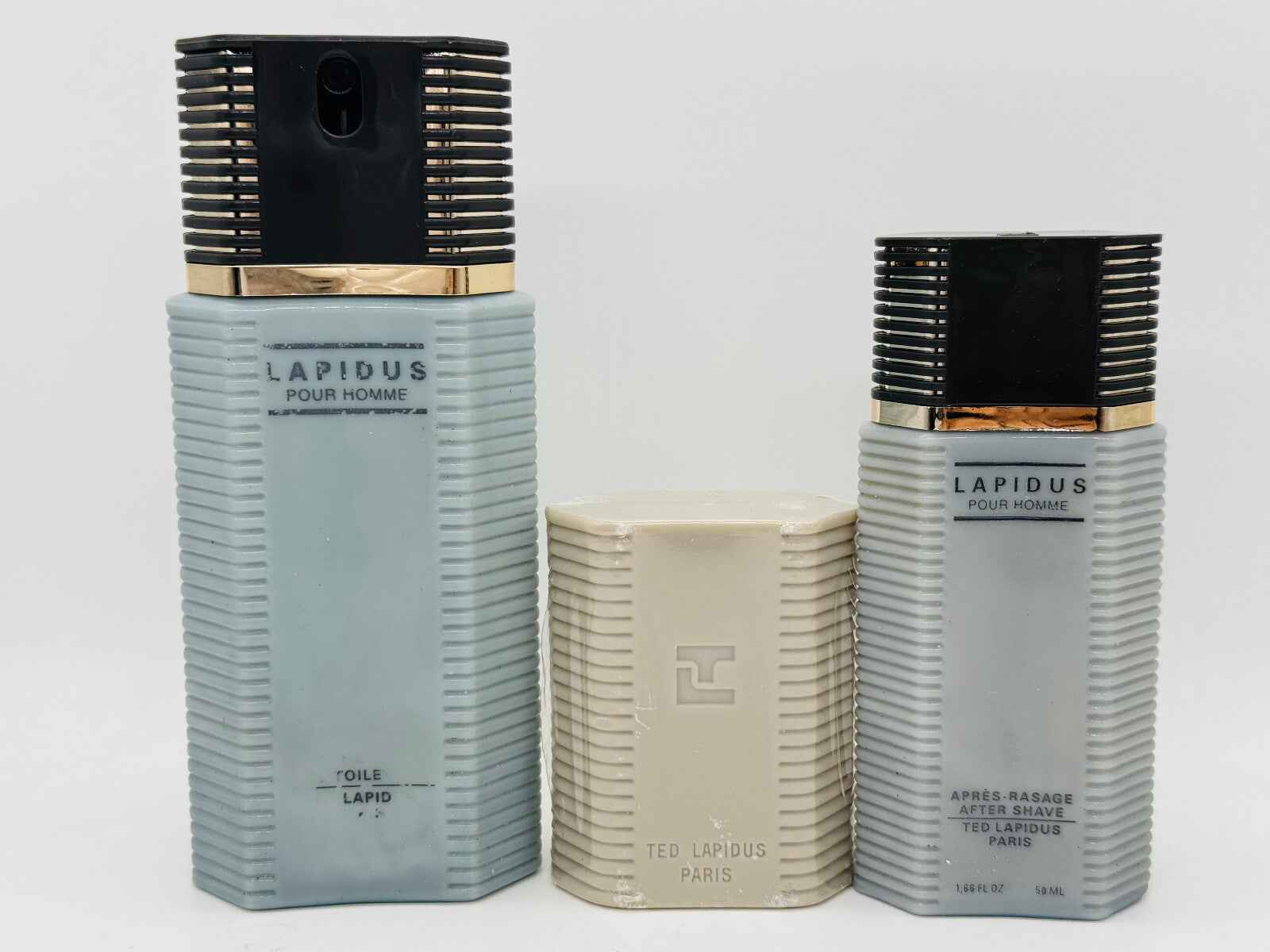 Set di prodotti Ted Lapidus Pour Homme, includendo profumo e dopobarba in eleganti flaconi