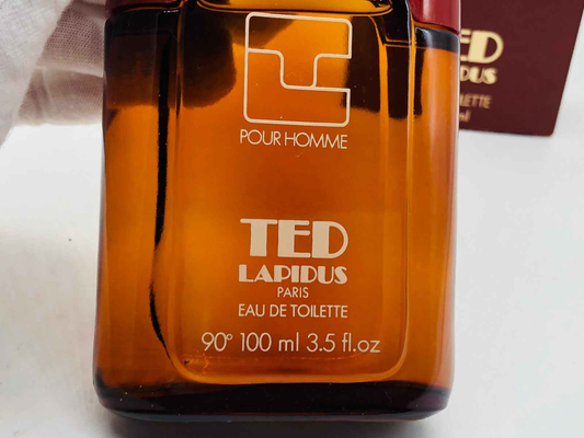 Flacone di Ted Lapidus Pour Homme Vintage, eau de toilette da 100 ml in un design elegante e raffinato