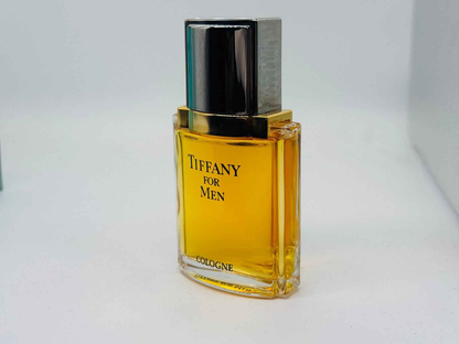 Profumo Tiffany For Men Vintage in flacone elegante con tappo metallico e liquidità dorata