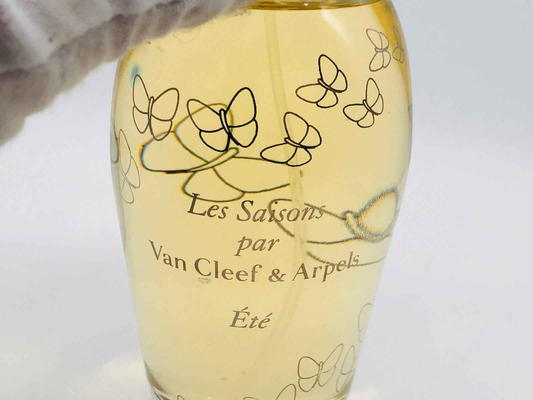 Flacone di profumo Les Saisons Ete di Van Cleef & Arpels con dettagli eleganti e design raffinato