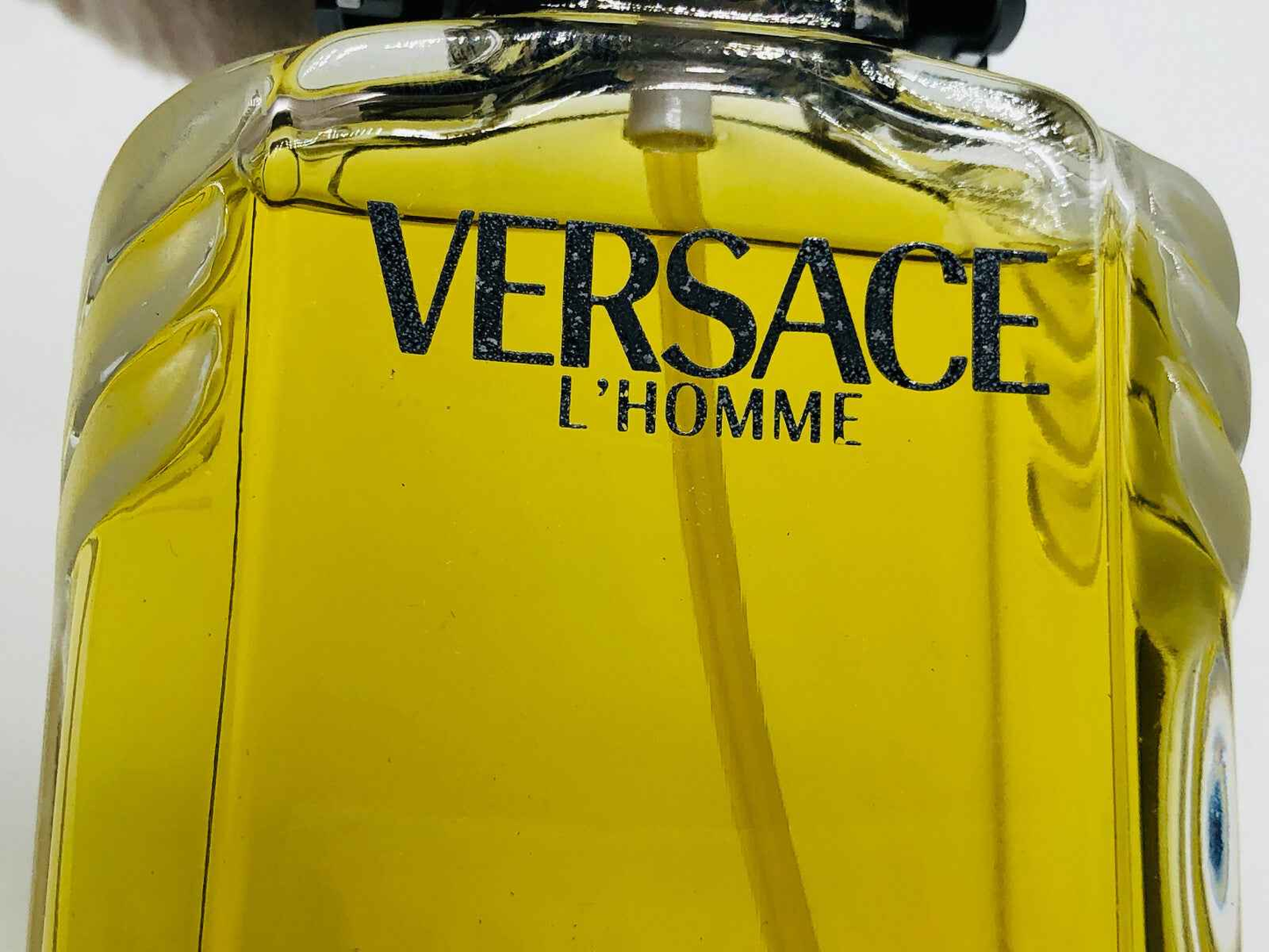 Flacone di profumo Versace Homme Vintage con aroma elegante e raffinato per ogni occasione