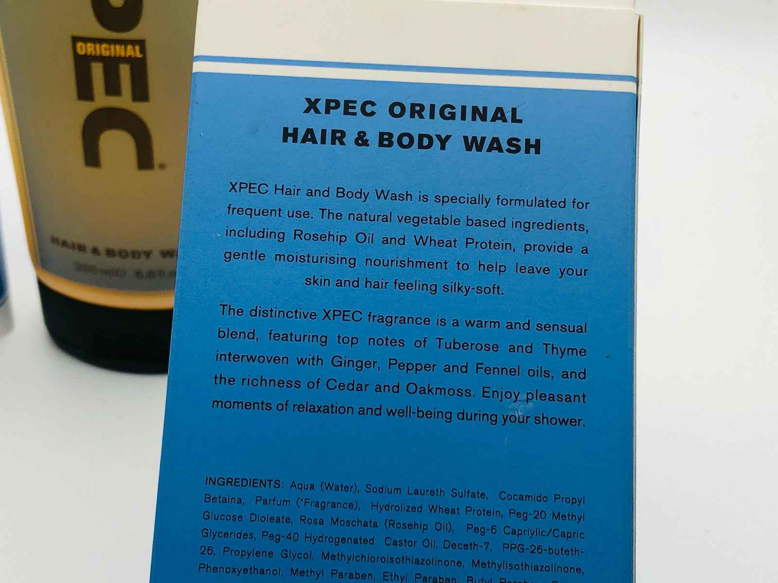 Xpec Hair Body Wash con ingredienti idratanti come olio di rosa e proteina del grano
