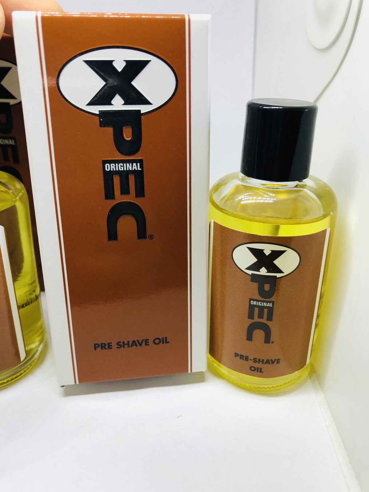 Olio Pre Barba Xpec in confezione con etichetta caratteristica per una rasatura liscia e confortevole