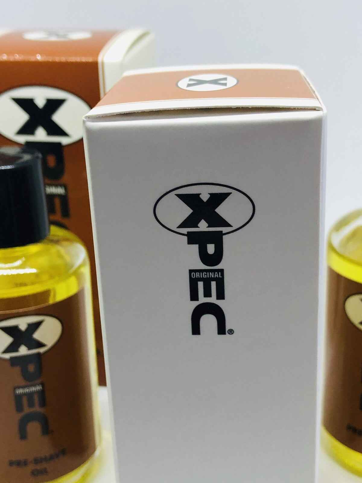 Xpec Olio Pre Barba in bottiglia trasparente con etichetta, ideale per una rasatura liscia