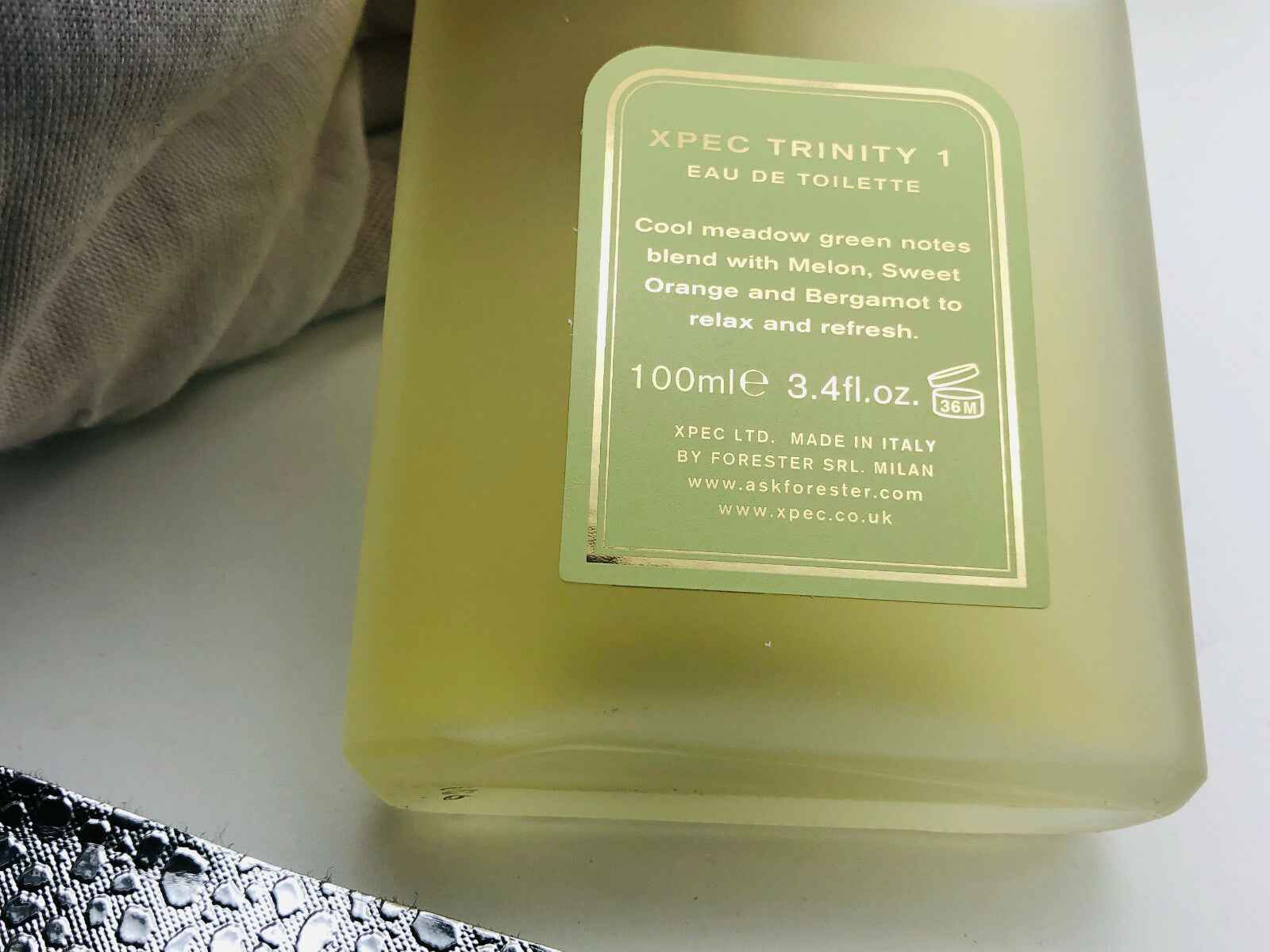 Profumo Xpec Trinity in flacone da 100ml con note di melone e bergamotto per una fresca fragranza