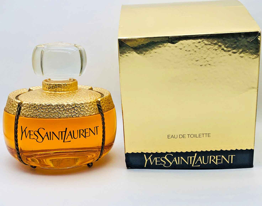 Profumo Ysl Champagne Vintage in flacone dorato con confezione elegante di Yves Saint Laurent